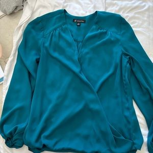 Loose turquoise blouse